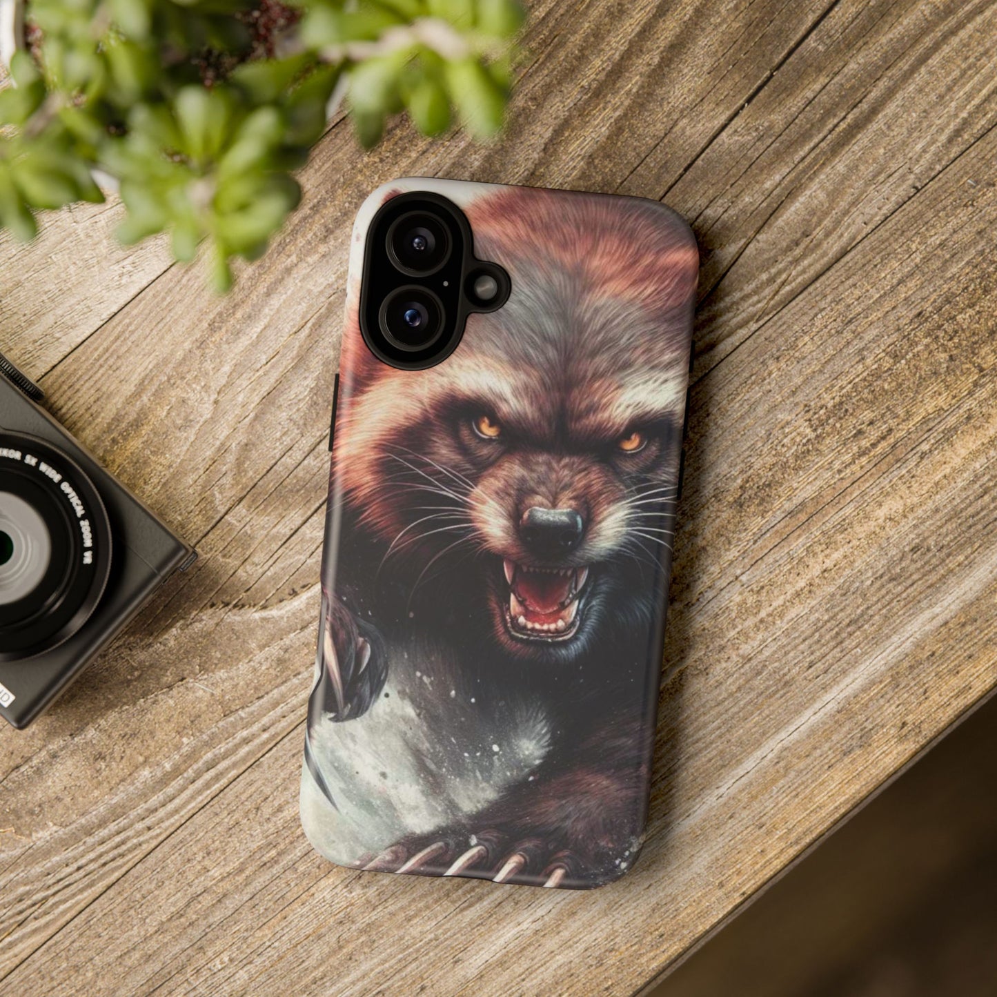 Wolverine snarling with claws out on a phone case.