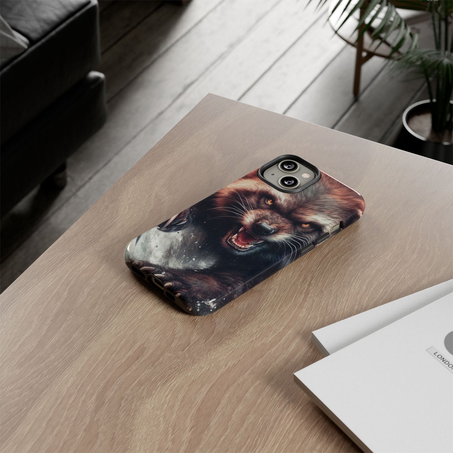 Wolverine snarling with claws out on a phone case.
