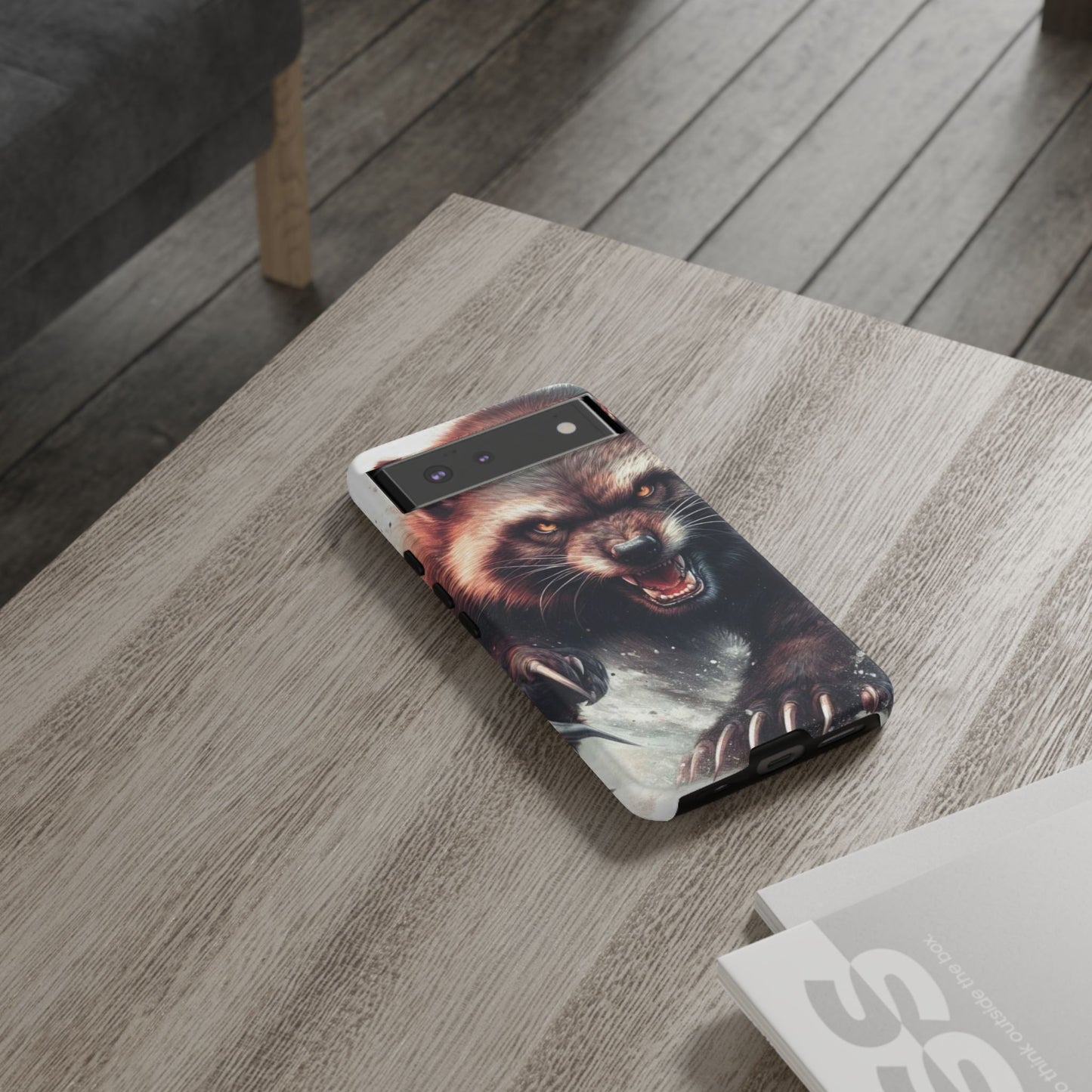 Wolverine snarling with claws out on a phone case.