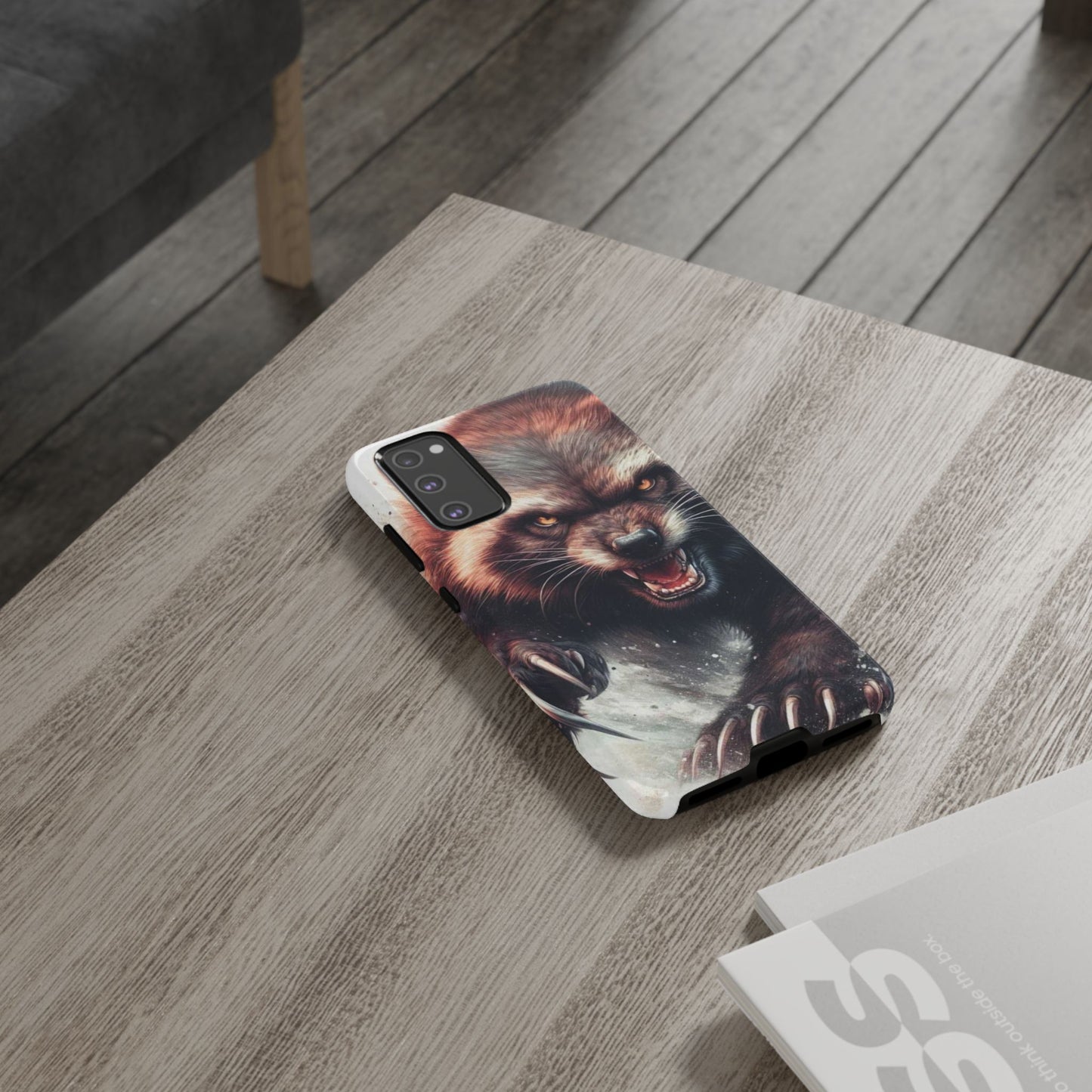 Wolverine snarling with claws out on a phone case.