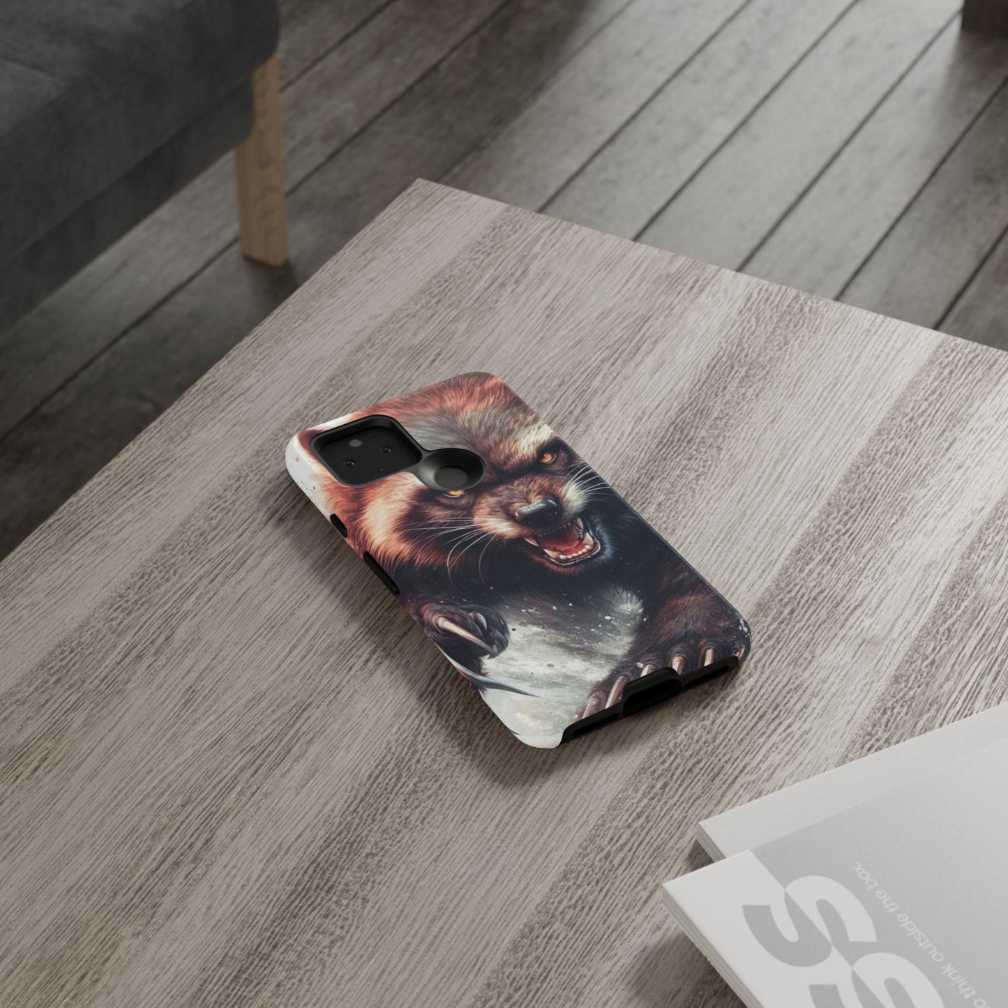 Wolverine snarling with claws out on a phone case.