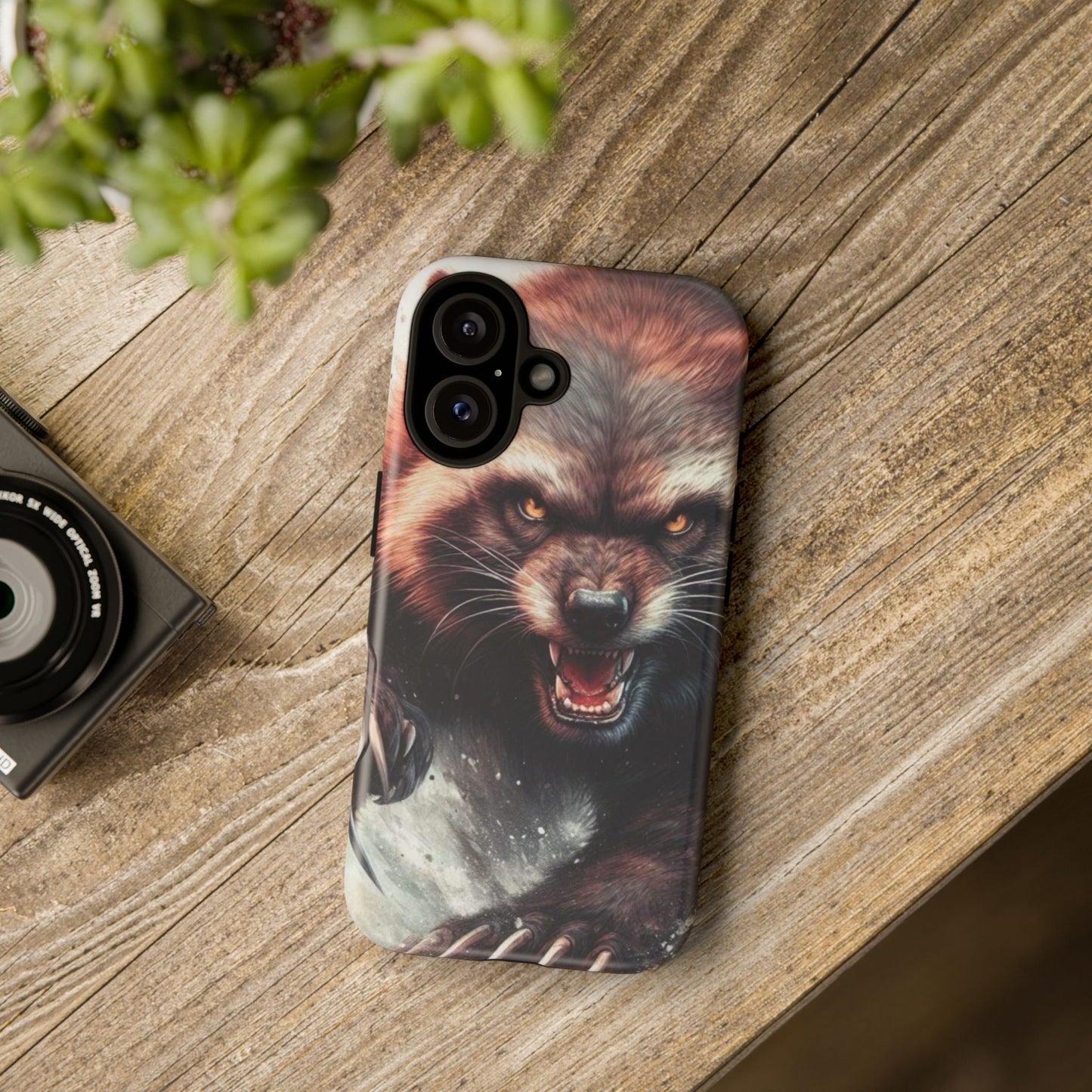 Wolverine snarling with claws out on a phone case.