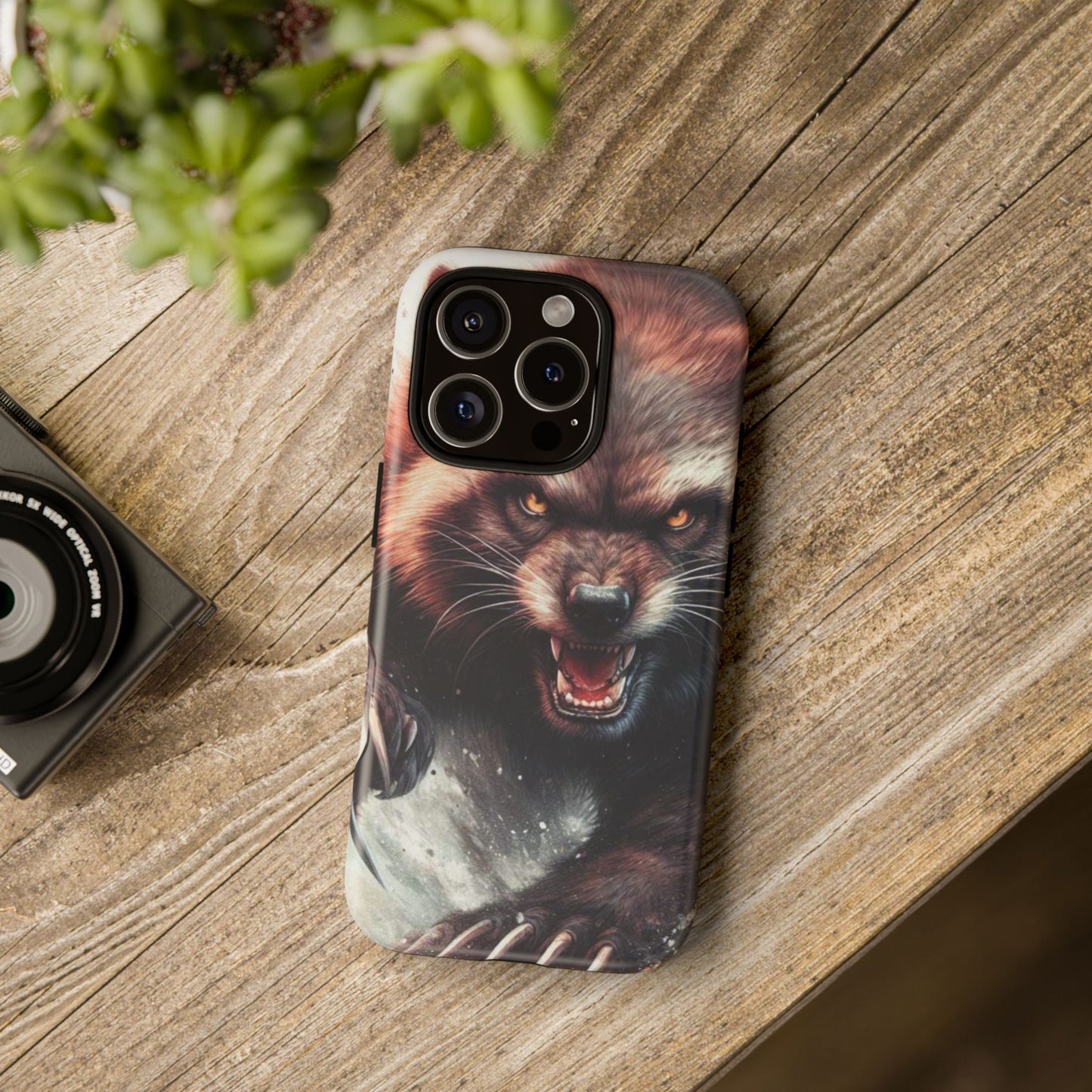 Wolverine snarling with claws out on a phone case.
