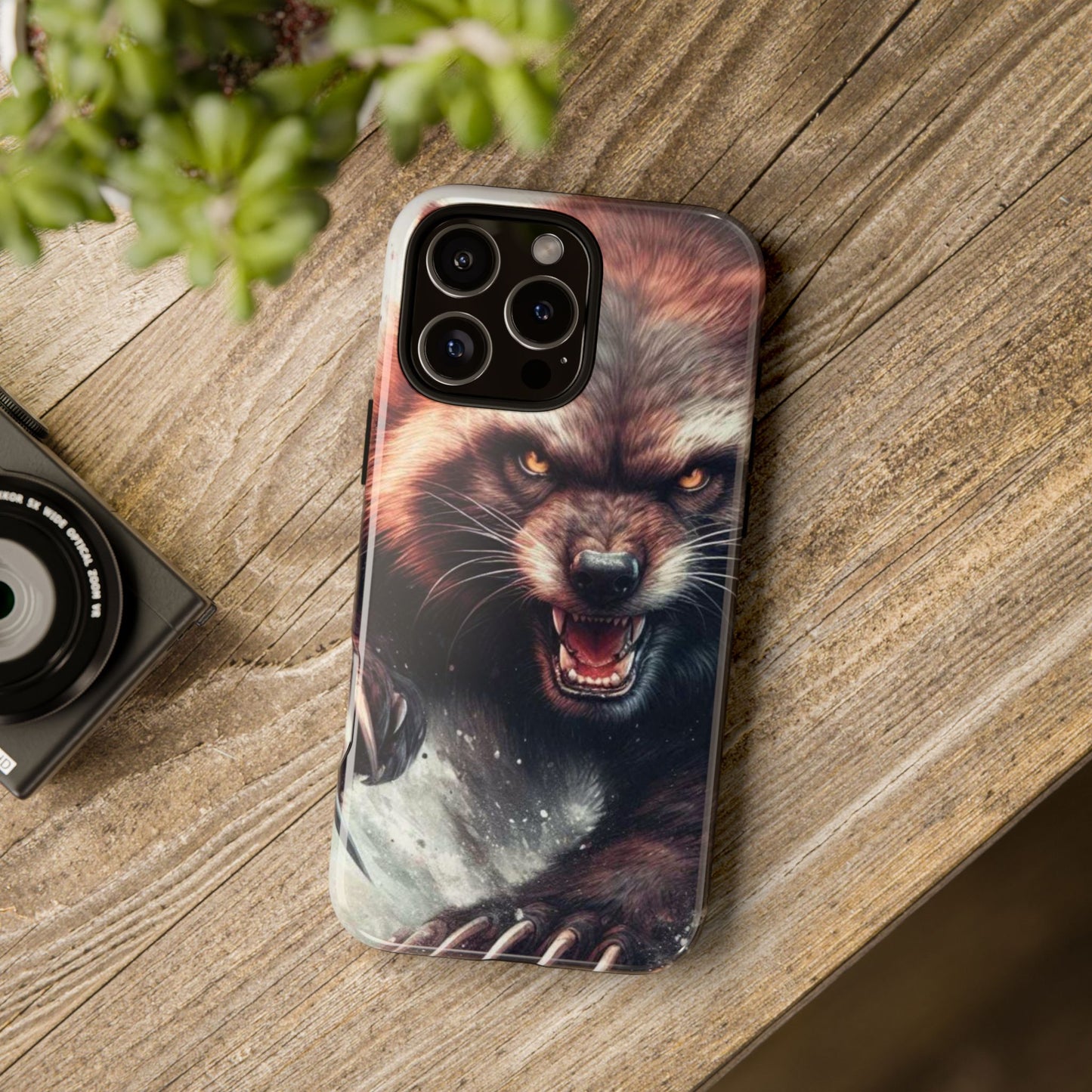 Wolverine snarling with claws out on a phone case.