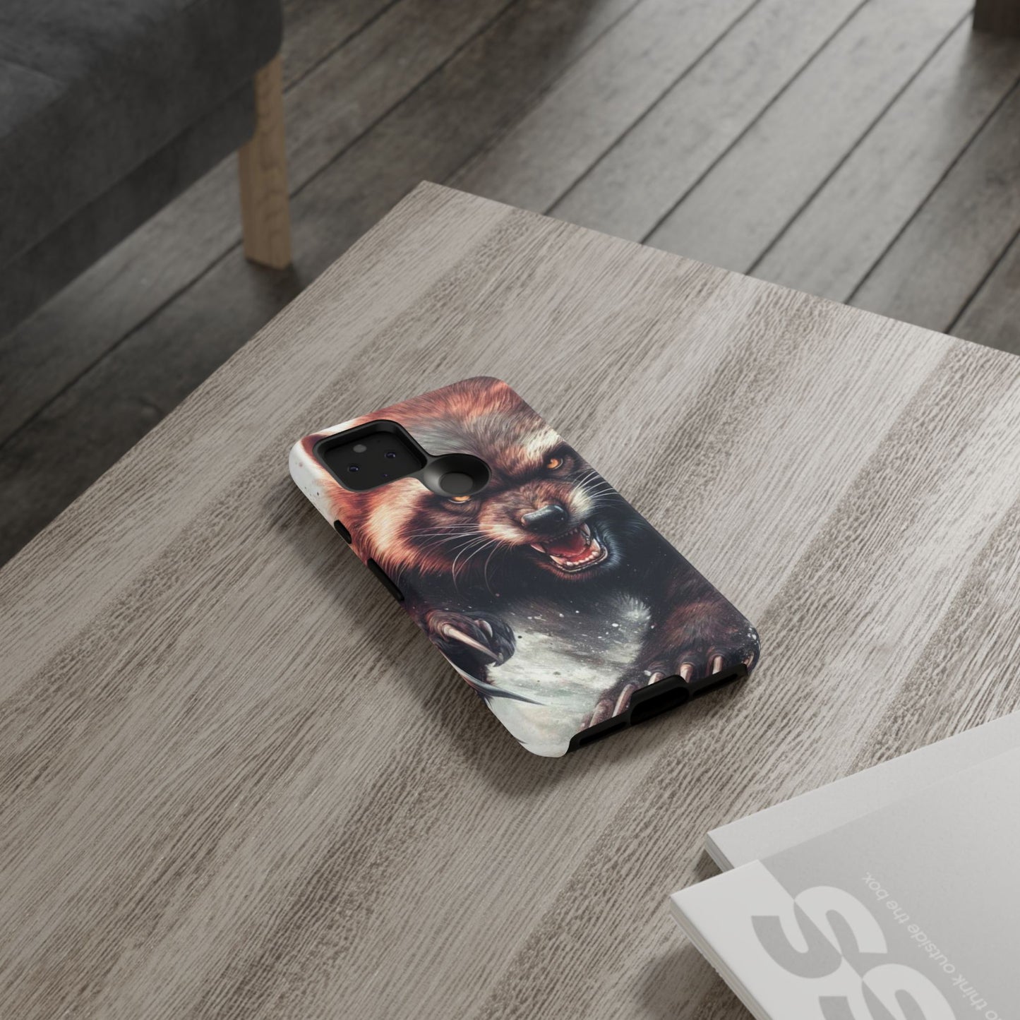 Wolverine snarling with claws out on a phone case.