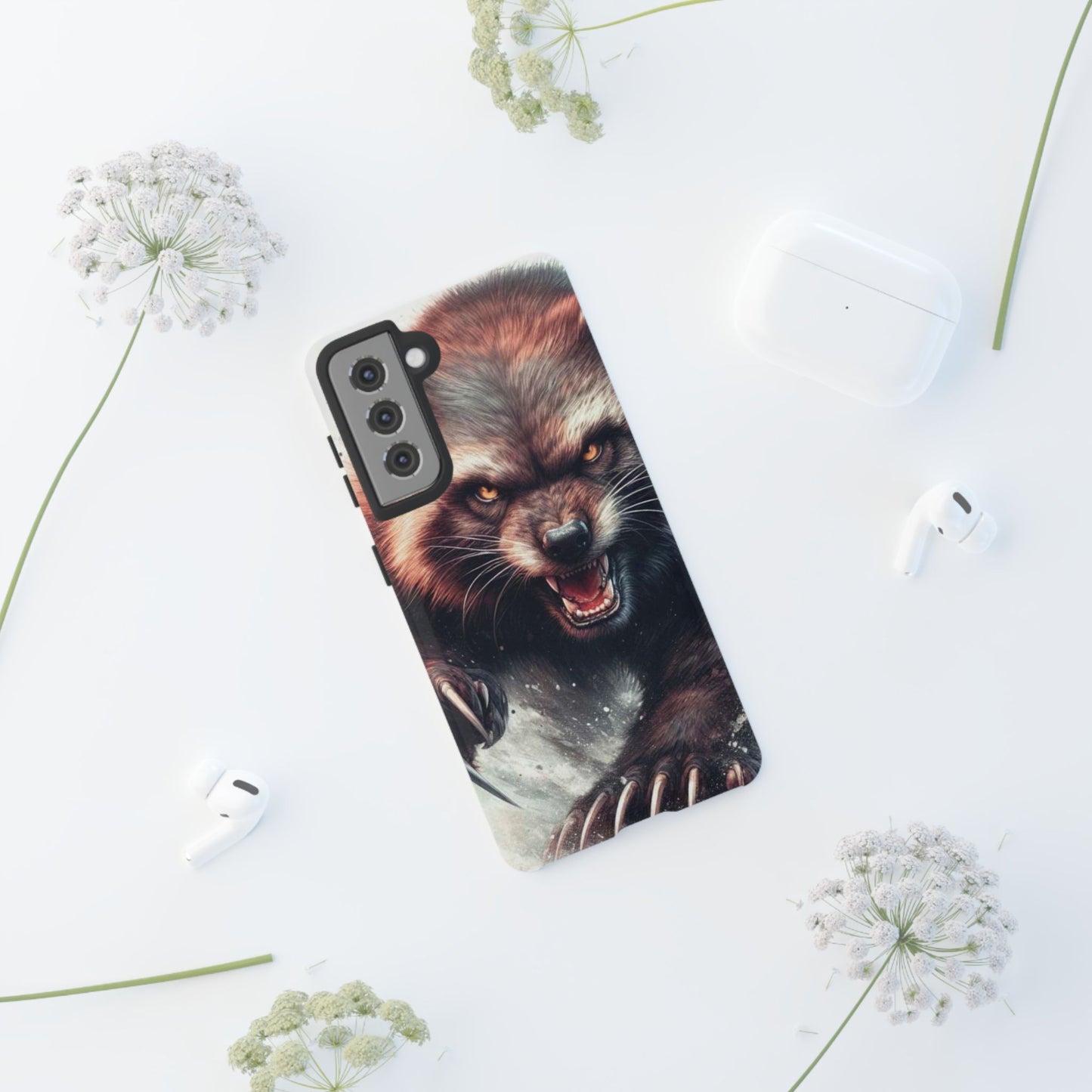 Wolverine snarling with claws out on a phone case.