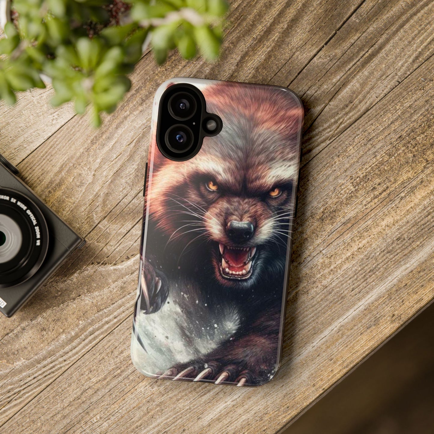 Wolverine snarling with claws out on a phone case.