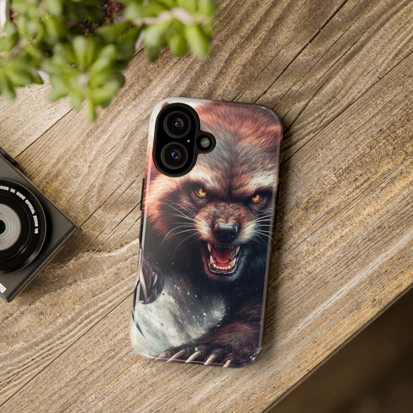 Wolverine snarling with claws out on a phone case.
